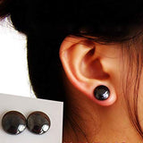 Pair of Magnetite Magnetic Disc Earrings and Model